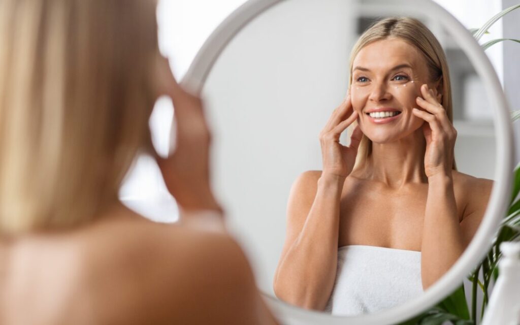 Anti-aging,Cosmetics.,Beautiful,Middle,Aged,Woman,Applying,Eye,Cream,While